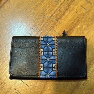 Black, leather wallet with Palestinian embroidery. Back zipper pocket fo…